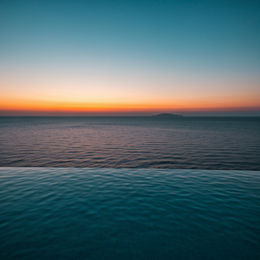 A luxury Mediterranean villa at dusk, infinity pool reflecting the amber sky.